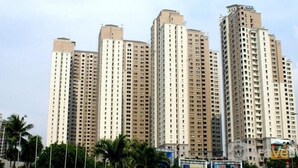 A high-rise residential building with multiple balconies, likely offering views of the surrounding area. - Cozy And Modern 2Br Apartment Marina Ancol (Jakarta)