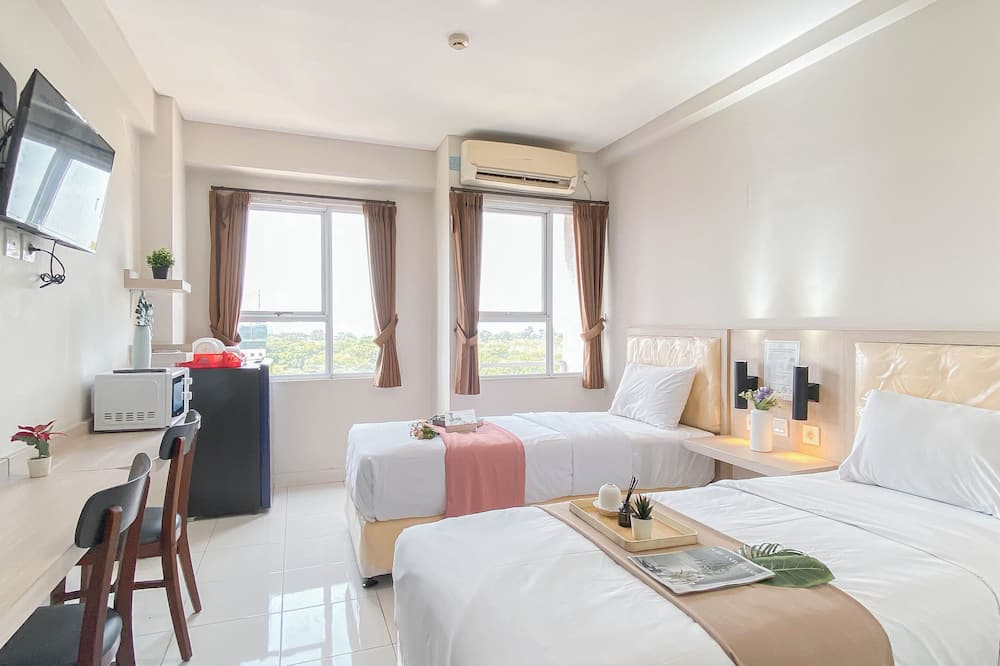 Simple Studio (No Kitchen) At Elvis Tower Apartment