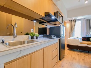 Standard Studio | Private kitchen - Classic Studio At Tokyo Riverside Pik 2 Apartement (Teluknaga)