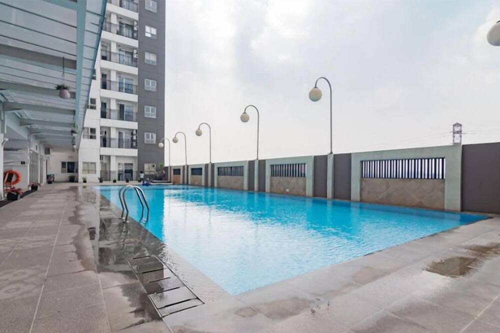 Wooden Accent 2Br At Mekarwangi Square Cibaduyut Apartment