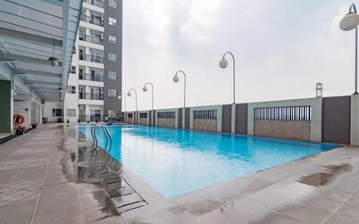 Wooden Accent 2Br At Mekarwangi Square Cibaduyut Apartment