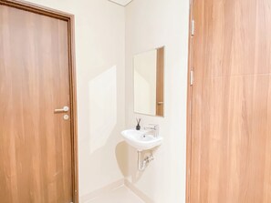 Standard Studio | Bathroom - Cream Tone 1Br At Royal Sentul Park Apartment (Bogor)