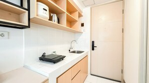 Standard Studio | Private kitchen - Relaxing Studio Apartment At Tokyo Riverside Pik 2 (Teluknaga)