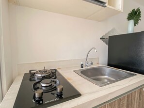 Standard Apartment | Private kitchen - Trendy 1Br Apartment At Vittoria Residence (Jakarta)