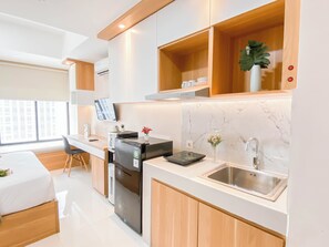 Standard Studio | Private kitchen - Simple Compact Studio At Apartment Pollux Chadstone (Cikarang)