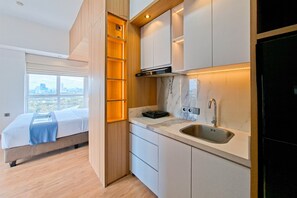 Standard Studio - Wooden Tone Studio At Casa De Parco Apartment (Pagedangan)