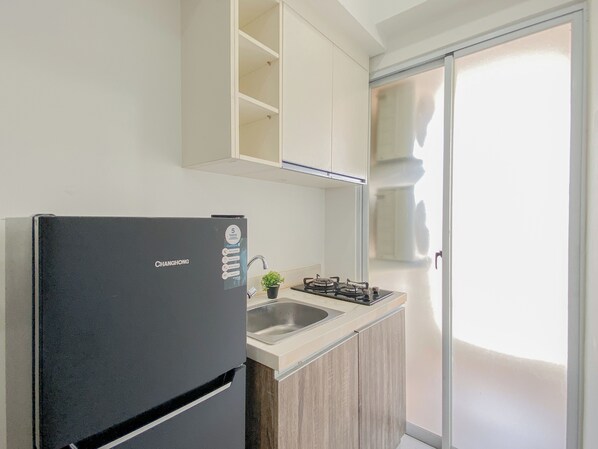 Standard Apartment | Private kitchen - Restful 1Br Apartment At Vittoria Residence (Jakarta)