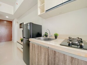 Standard Apartment | Private kitchen - Restful 1Br Apartment At Vittoria Residence (Jakarta)
