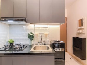 Standard Apartment | Private kitchen - Standard 2Br At Podomoro Golf View Apartment (Gunung Putri)