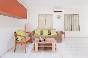 Standard Apartment | Living area - Modern 4Br Apartment At Guest House Vanya Park (Pagedangan)