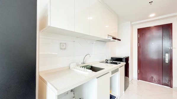 Apartamento standard | Cozinha privada | Talheres/pratos/utensílios de cozinha