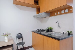 Standard Apartment | Private kitchen - Standard Studio Room At Cinere Resort Apartment (Depok)