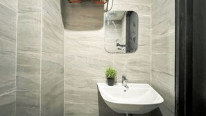 Standard Apartment | Bathroom - Modern Look Studio Room At Collins Boulevard Apartment (Tangerang)