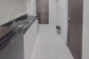 Standard Apartment | Private kitchen - Basic Studio At Tamansari Prospero Sidoarjo Apartment (Sidoarjo)