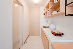 Standard Apartment | Private kitchen - Studio Apartment At Tokyo Riverside Pik 2 (Teluknaga)