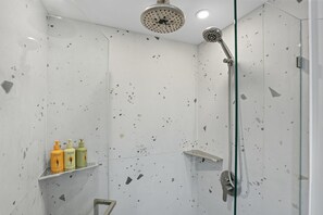 Shower, eco-friendly toiletries, hair dryer, towels