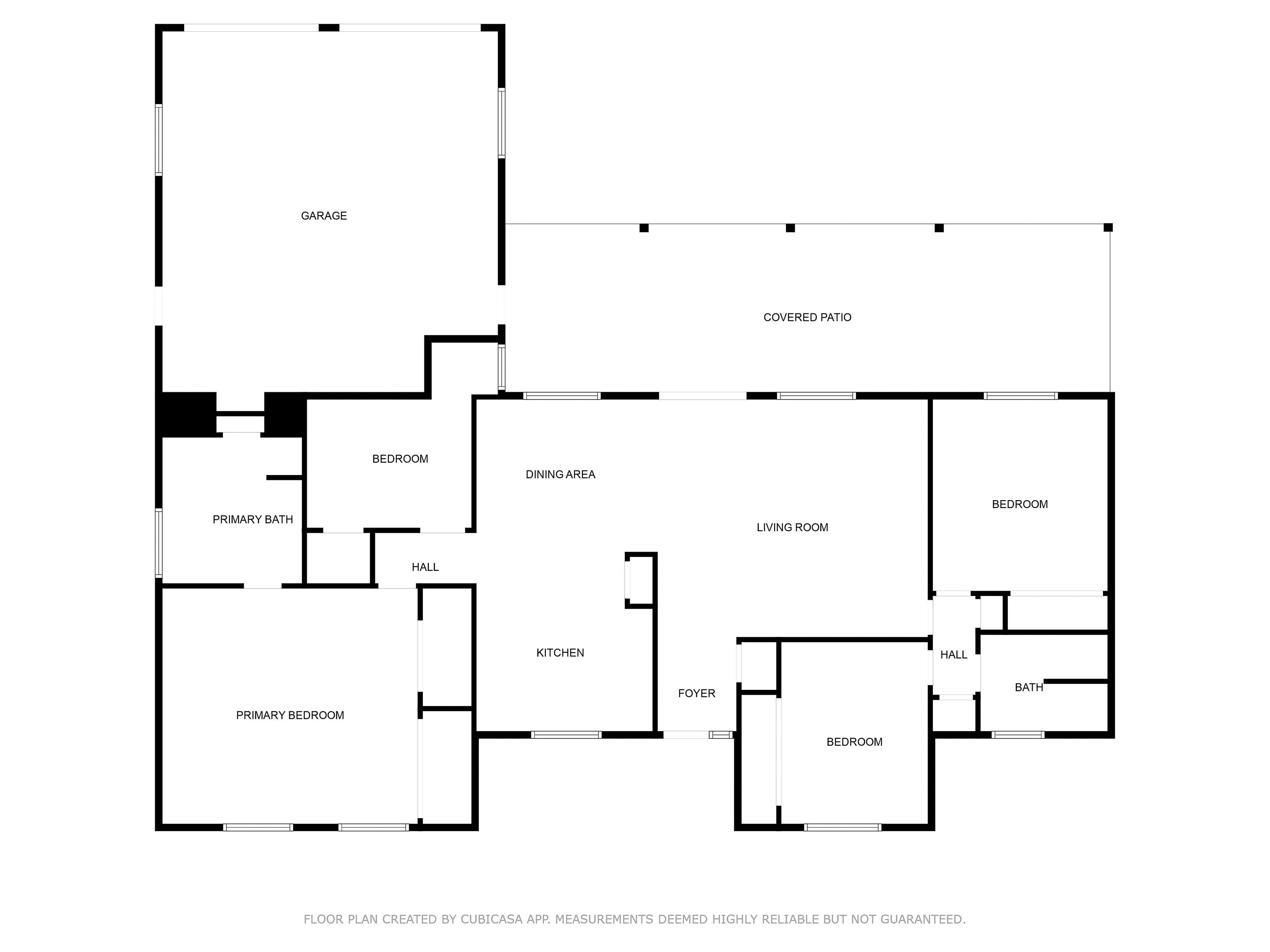 Planta baixa mostrando um alpendre coberto, quarto principal, sala de jantar, cozinha, hall de entrada e um quarto secundário.