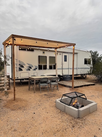 Outdoor dining. 2-bedroom recreational vehicle in delightful Tucson with all amenities