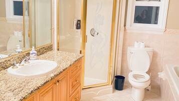 Jetted tub, hair dryer, towels, soap