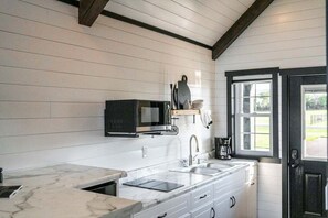 Microwave, stovetop, coffee/tea maker, toaster