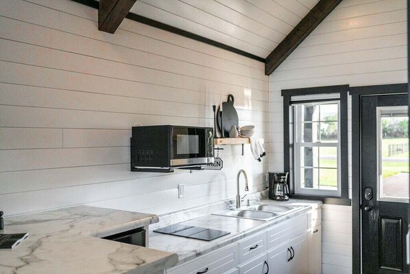 Microwave, stovetop, coffee/tea maker, toaster