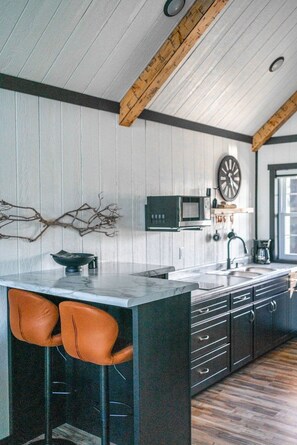 Fridge, microwave, stovetop, coffee/tea maker