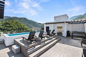 Terrace/patio - Brand New Condo w Rooftop Pool and Oceanview (Puerto Vallarta)
