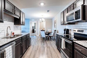 Apartment (3 Bedrooms) | Private kitchen | Fridge, coffee/tea maker - Landing Apartments Cocoa Beach  (Cocoa)