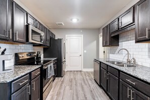 Apartment (2 Bedrooms) | Private kitchen | Fridge, coffee/tea maker - Landing Apartments Cocoa Beach  (Cocoa)