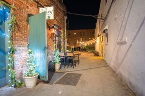 Outdoor dining - The Vault on Front Street | Historic Luxury Loft (Wilmington)