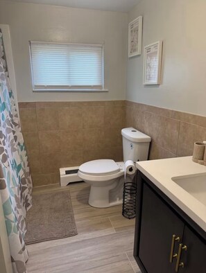 Hair dryer, towels, soap, toilet paper