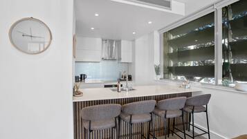 Coffee/tea maker, fridge, microwave, oven