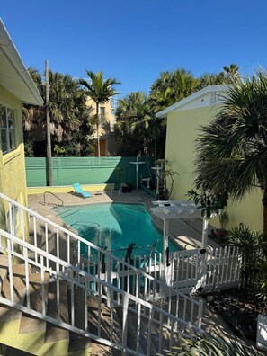 Outdoor pool - Penguins on the Beach | 1BR Beach Shack Steps to Beach & Downtown w/pool | Unit C (Cocoa Beach)