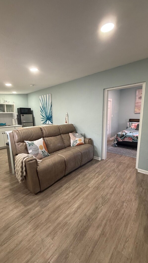 Smart TV, books - Penguins on the Beach | 1BR Beach Shack Steps to Beach & Downtown w/pool | Unit C (Cocoa Beach)