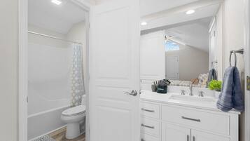 Shower, jetted tub, hair dryer, towels