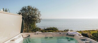 Ocean Views Stun at this Coastal Water's Edge Home