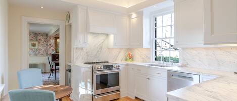 Fridge, oven, dining tables