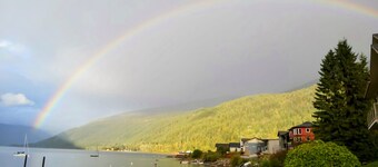 Lakefront Retreat 2 bedroom sleeps 6,  private hot tub and beach.