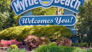 A sign for Myrtle Beach with a welcoming message. - Stunning 10th-Floor 1-Bedroom Oceanview Condo (Myrtle Beach)