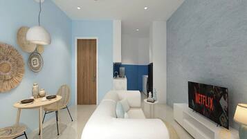 Premium Suite | Ruang tamu | 41 inci sebuah televisyen pintar dengan kabel, Netflix