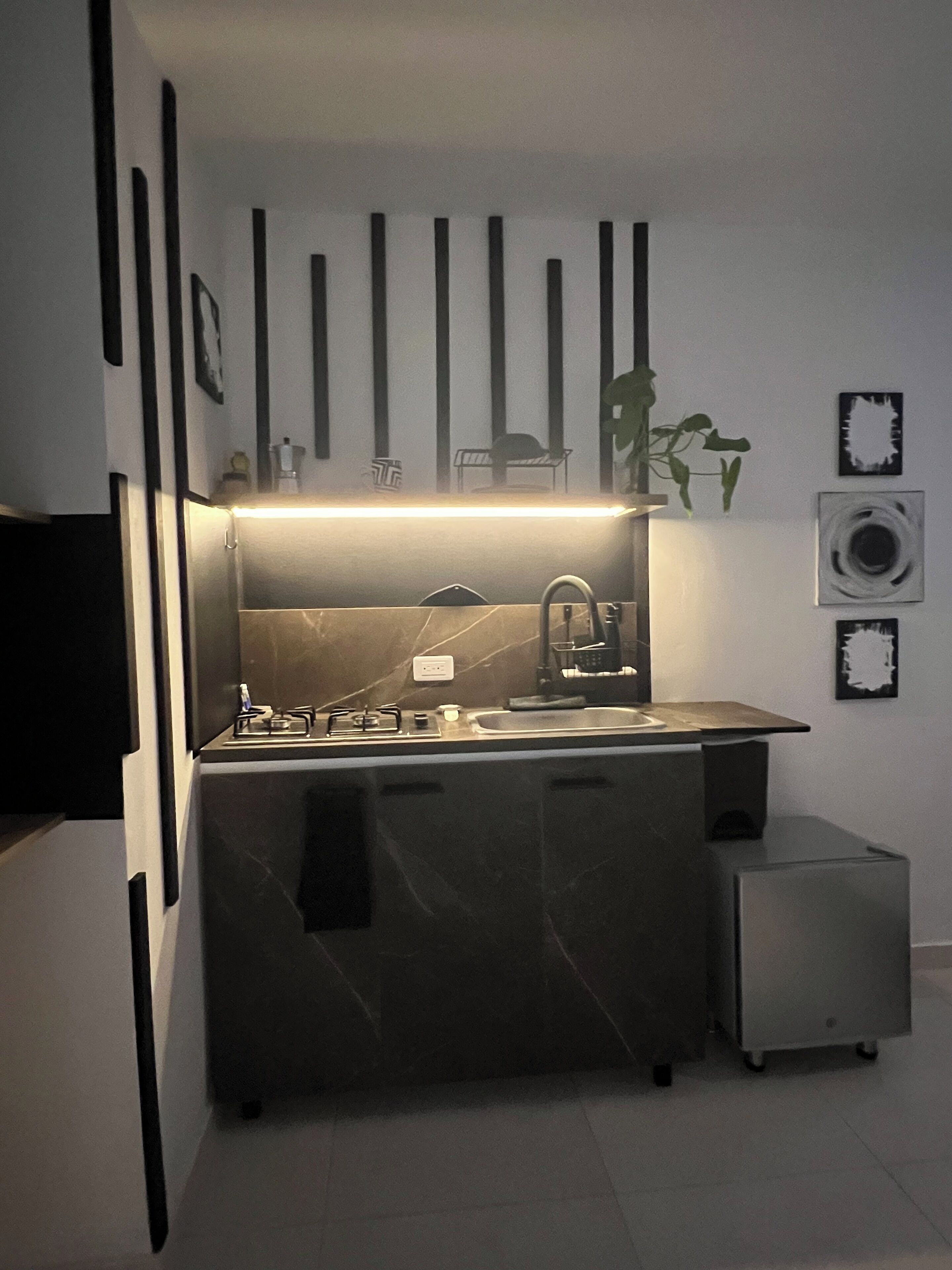 Fridge, stovetop, coffee/tea maker, cookware/dishes/utensils