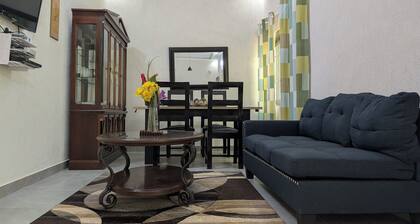 Fabulous 2-bedroom apartment with AC in Abomey Calavi and private backyard