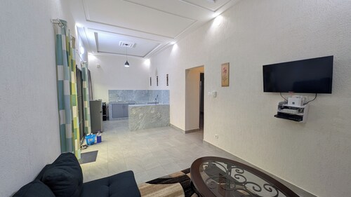 Fabulous 2-bedroom apartment with AC in Abomey Calavi and private backyard