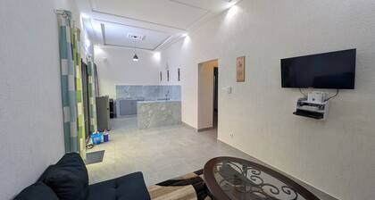 Fabulous 2-bedroom apartment with AC in Abomey Calavi and private backyard