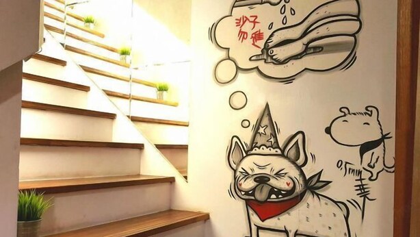 A staircase with wooden steps and small potted plants on the sides. - Mr.Rabbit (Pingtung)