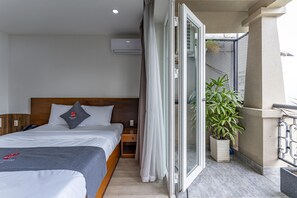 Suite, 1 cama Queen size y sofá cama, vista a la ciudad | Wifi gratis y acceso para silla de ruedas 