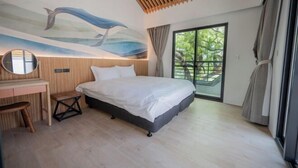 A modern bedroom with a bed, a desk, and a large window. - Tiansong Villa (Yilan)