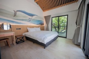 A modern bedroom with a bed, a desk, and a large window. - Tiansong Villa (Yilan)