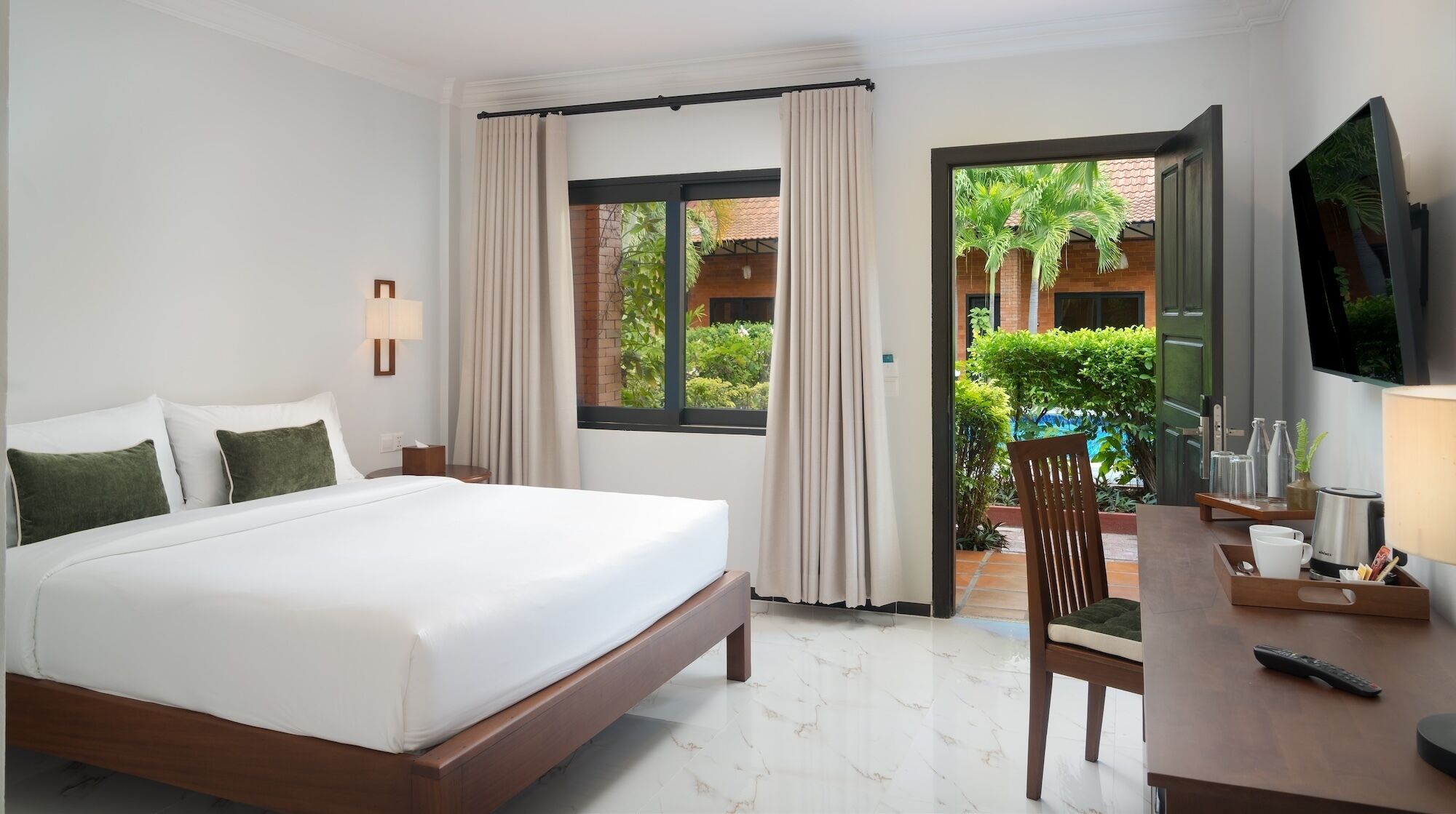 Una scrivania, postazione laptop, culle/letti per bambini (a pagamento)