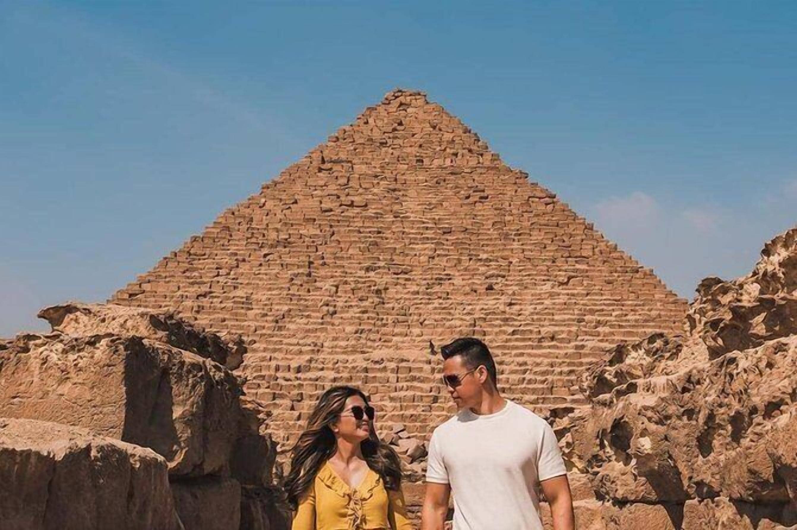 A pyramid structure with a clear sky in the background.